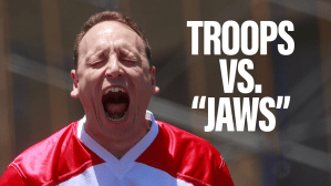 Can four service members beat Joey Chestnut in an eating competition?