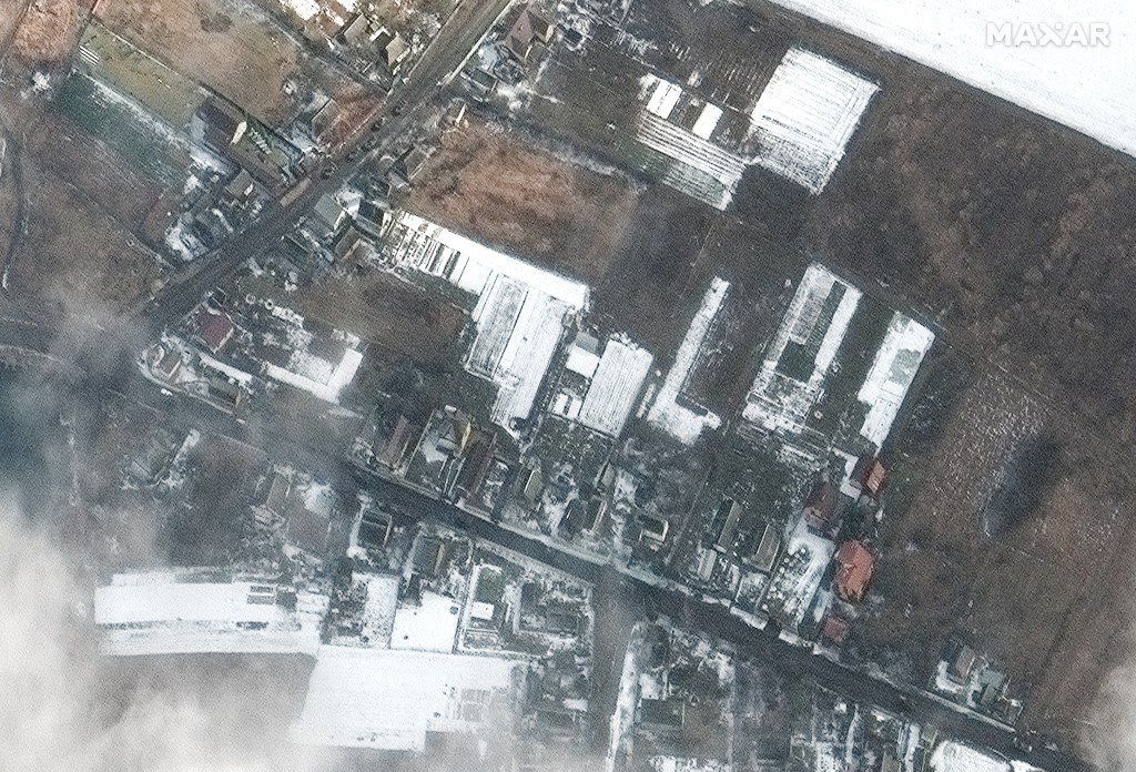 Russian military equipment, damaged bridge seen in satellite images