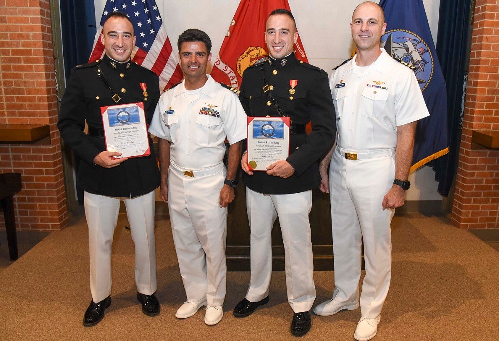 Identical twins earn aviator ‘wings of gold’ together