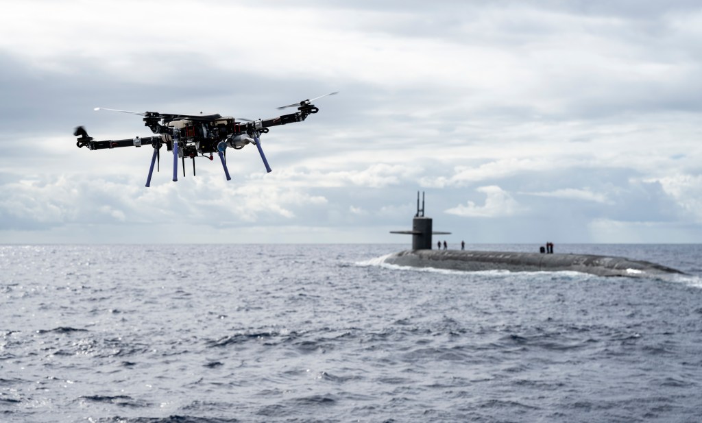 Watch a Navy drone resupply a ballistic missile submarine at sea