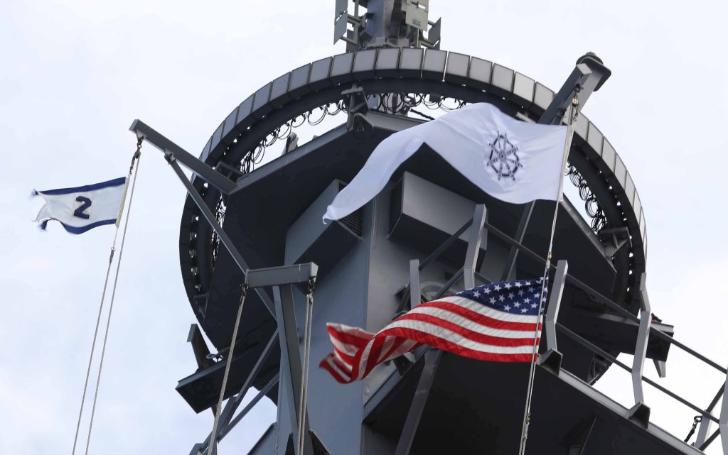 Navy flies Buddhist flag aboard ship for first time