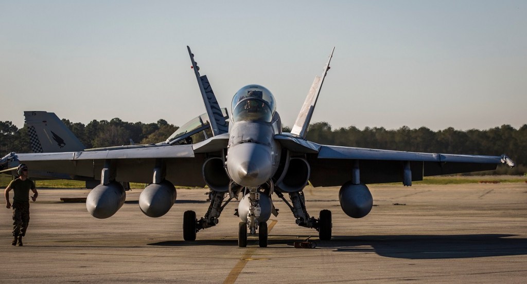 Marine Corps F/A-18D fighter jet makes emergency landing after engine bay catches fire