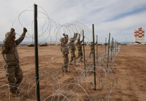 With another caravan approaching, DoD shifts forces along border
