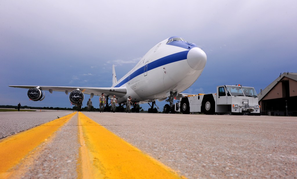 Maintainers under pressure to keep ‘Doomsday plane’ flying after flood wreaks havoc