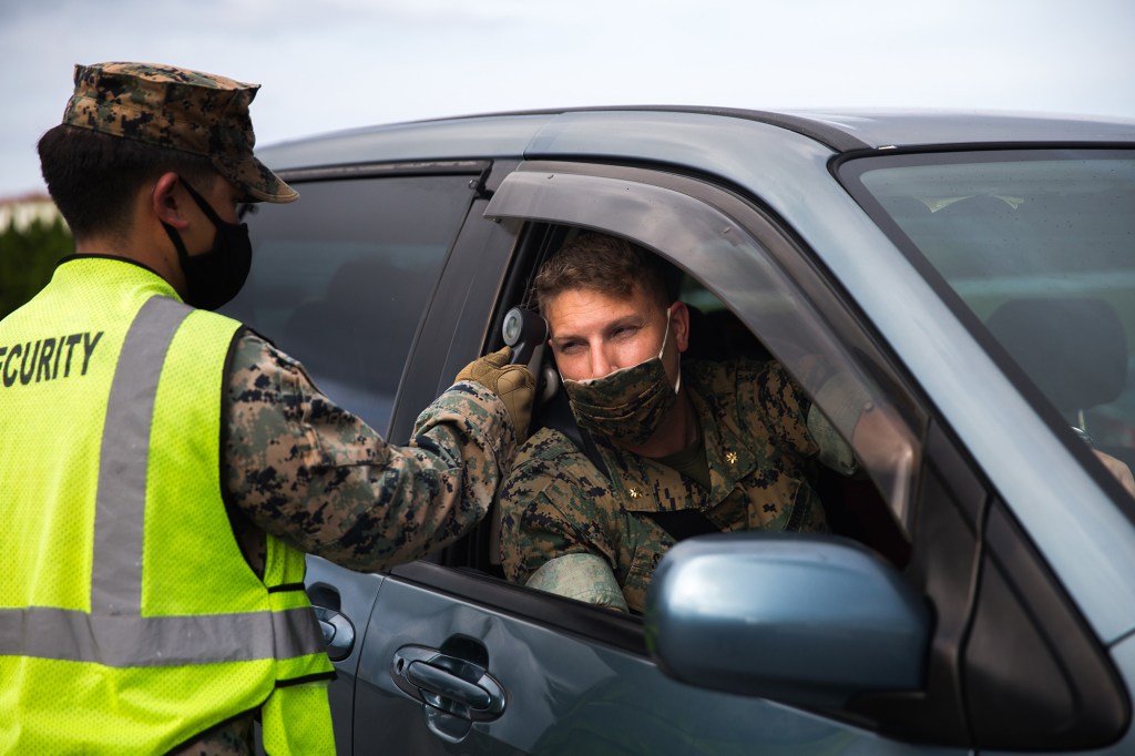 After spiking through June and July, military COVID-19 cases level off