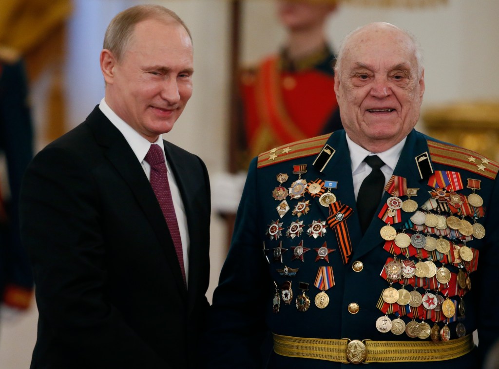 Putin says Russia will never yield to foreign pressure