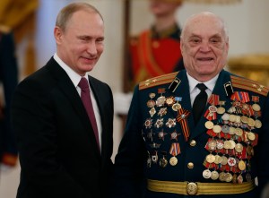 Putin says Russia will never yield to foreign pressure