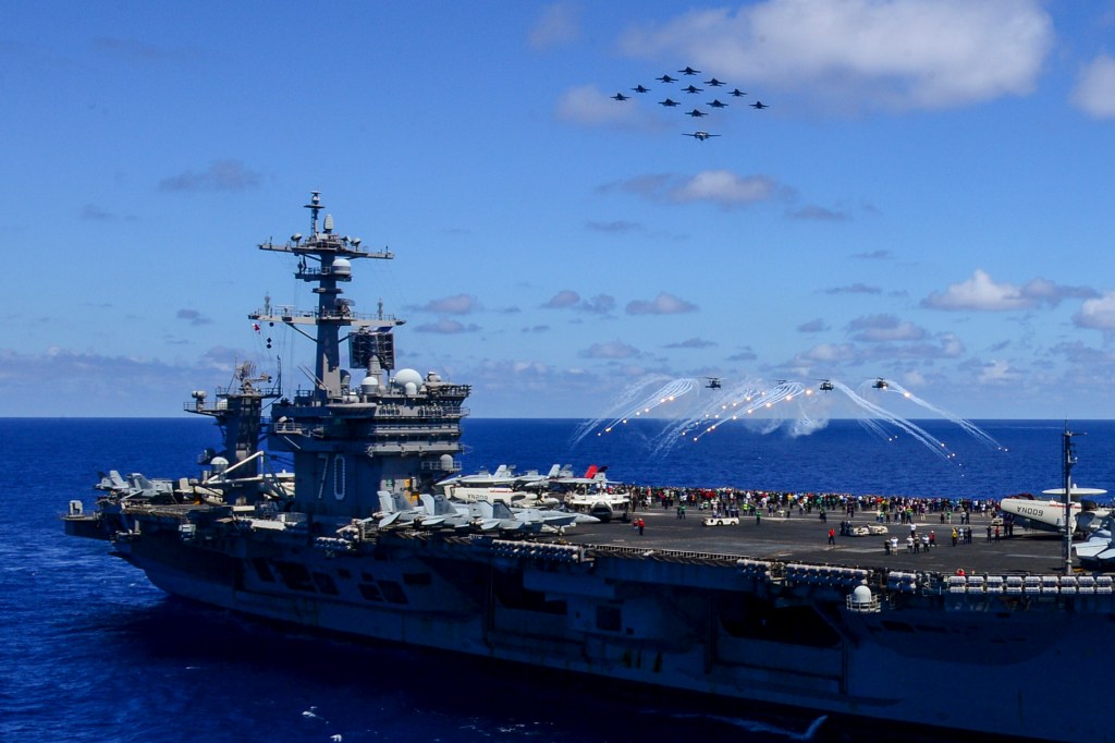 The Latest: Japanese fighter jets join US carrier in drills