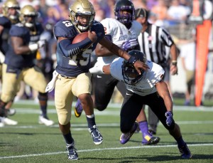 Navy runs through East Carolina, 45-21