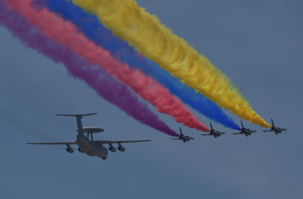 Chinese military contingent, including aircraft from virus-hit province, arrive in Singapore for air show