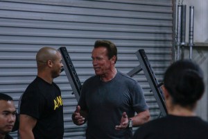 Arnold Schwarzenegger visits soldiers in Kuwait for renewable-energy doc