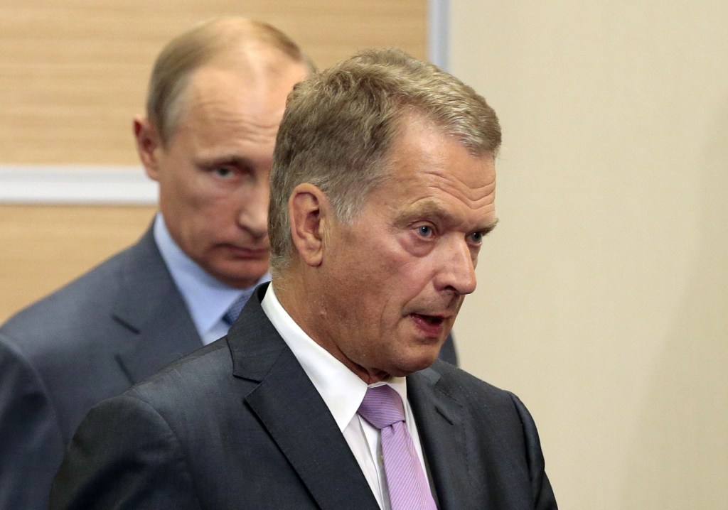 Putin Lures, Warns Finland Over Defense Ties