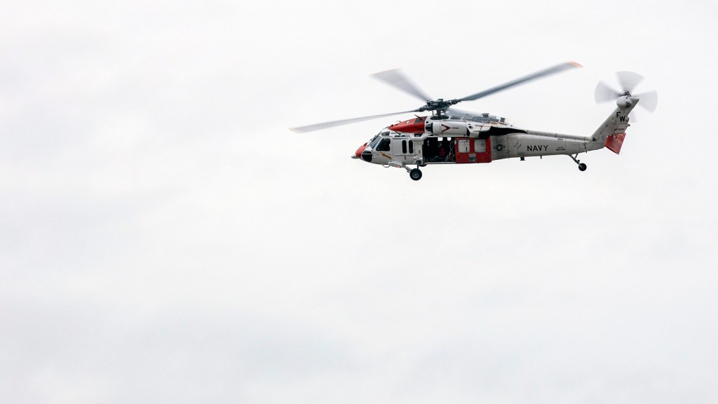 Navy search and rescue team saves snowmobiler in Washington