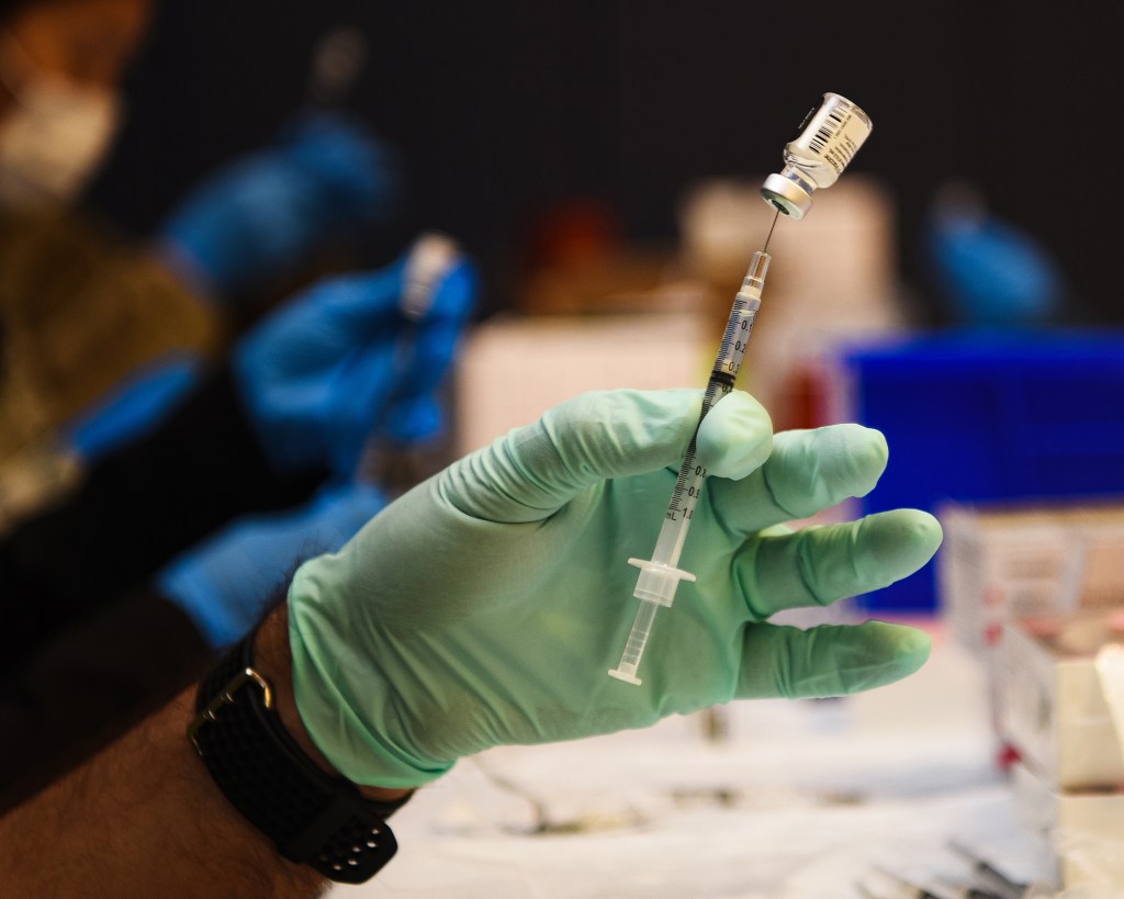 DoD has vaccinated nearly 300,000 civilians for COVID-19