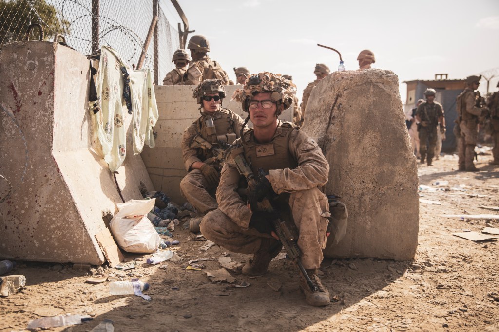 War in Afghanistan ended much as it began ― with U.S. Marines defending a runway