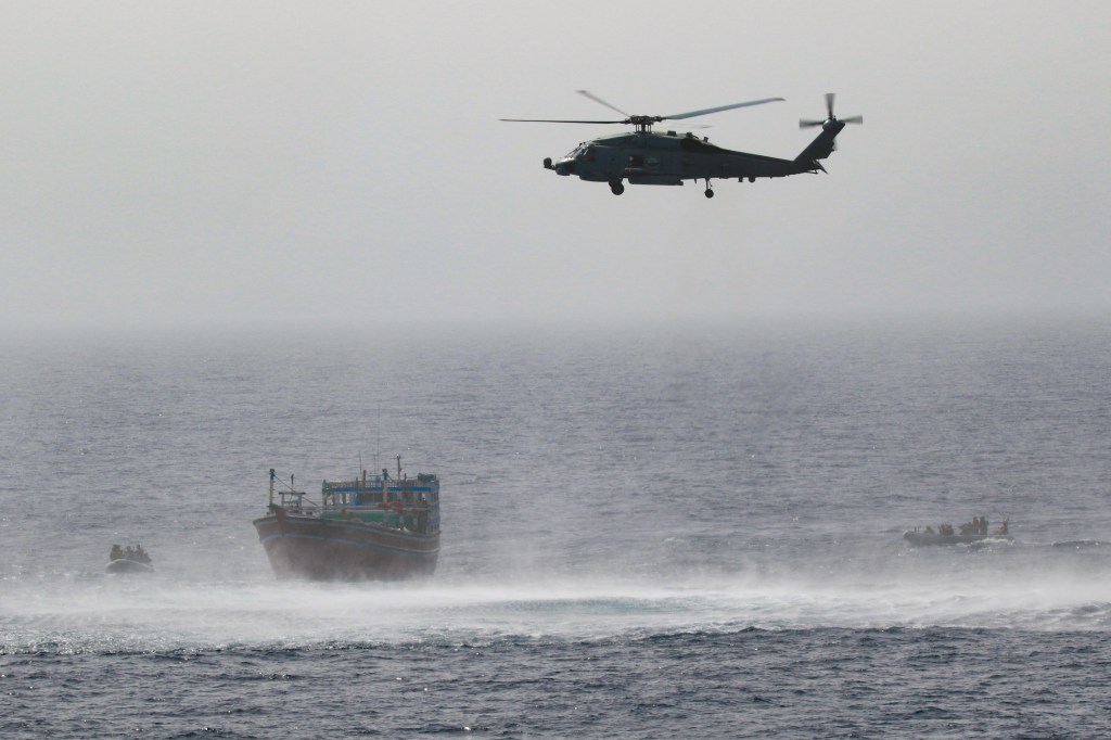 Destroyer Momsen and a Coast Guard team seize $39 million worth of illicit drugs in Gulf of Oman