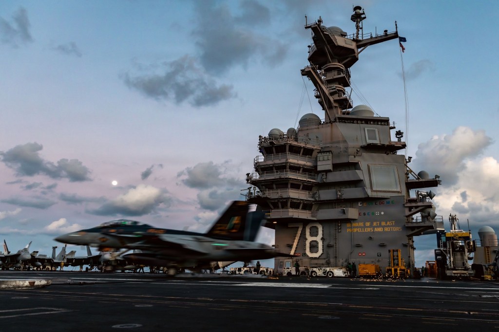 Onboard fire extinguished on aircraft carrier in Red Sea, Navy says