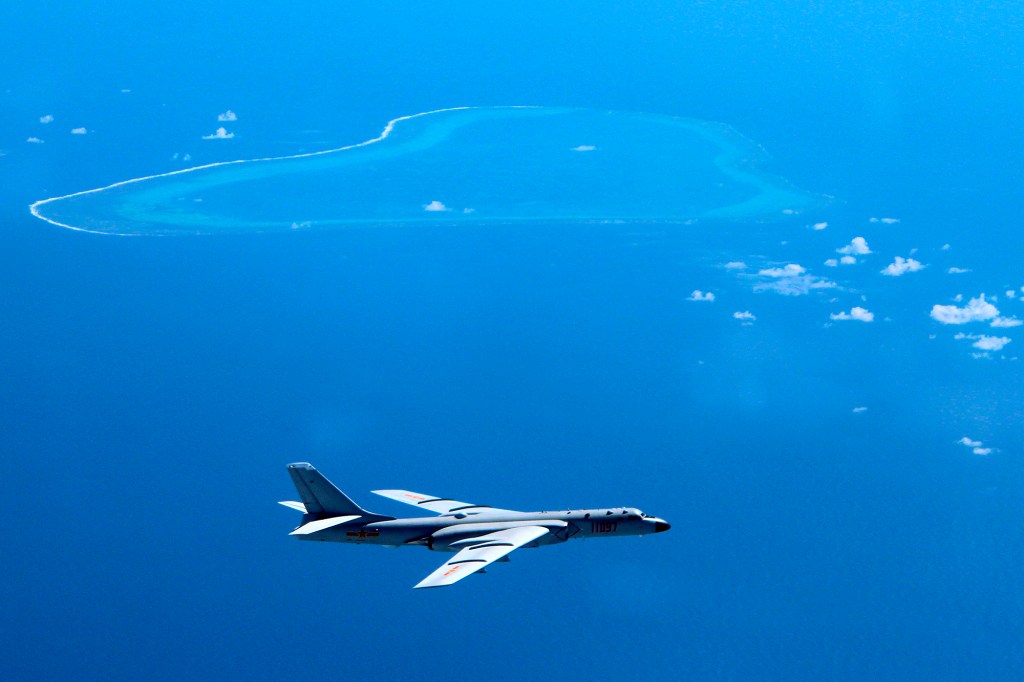 Chinese long-range bombers join drills over South China Sea