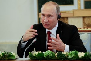 Putin denies involvement in hacking, hails Trump