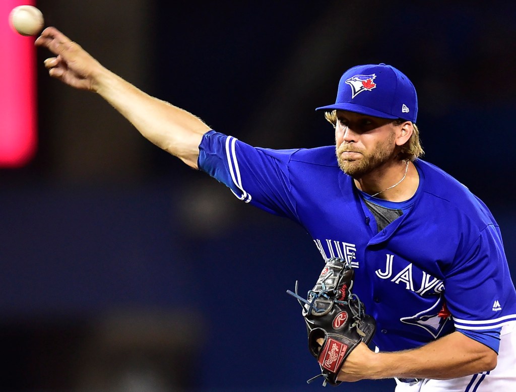 1st West Point grad in majors wins debut as Jays top Pirates