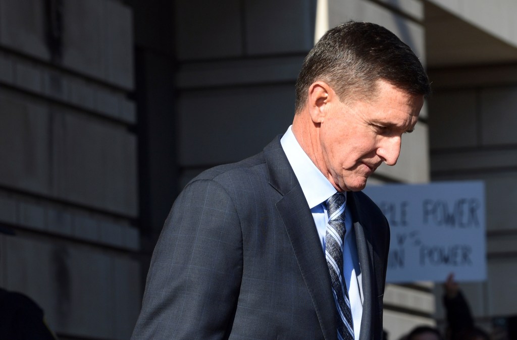 Former Trump adviser Flynn pleads guilty, is cooperating in Trump campaign probe