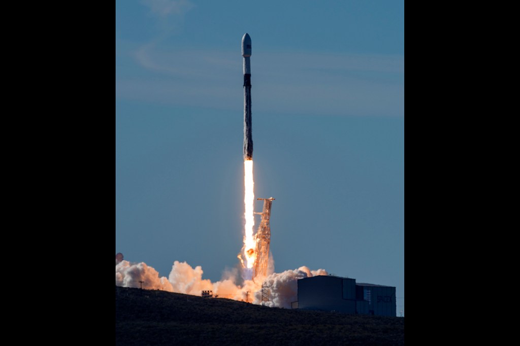 Reused rocket takes off carrying 64 satellites