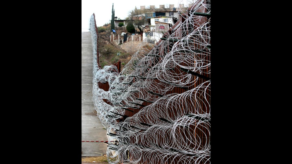 Some troops to spend the next month painting border fence with Mexico