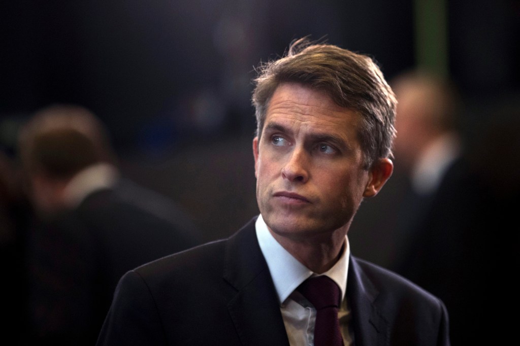 British defense minister sacked over leak inquiry