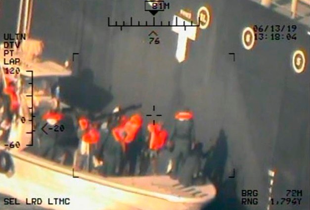 US releases photos to bolster claim Iran attacked tankers as 1,000 additional troops to be sent to Middle East