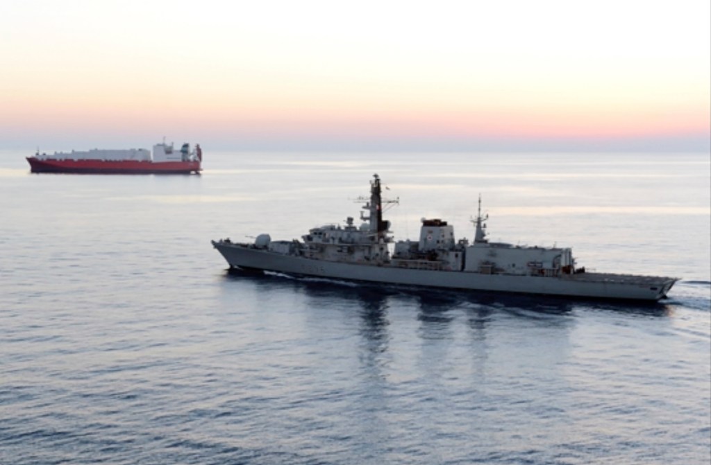 Britain says Iranian vessels tried to block tanker in Gulf