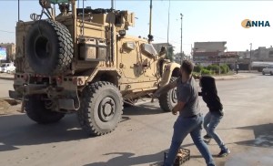 US military convoy withdrawing from Syria pelted with garbage by angry residents