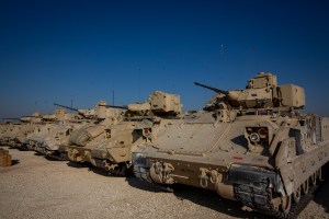 US sends mechanized troops back into Syria