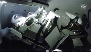 Astronauts arrive at space station in SpaceX’s Dragon capsule