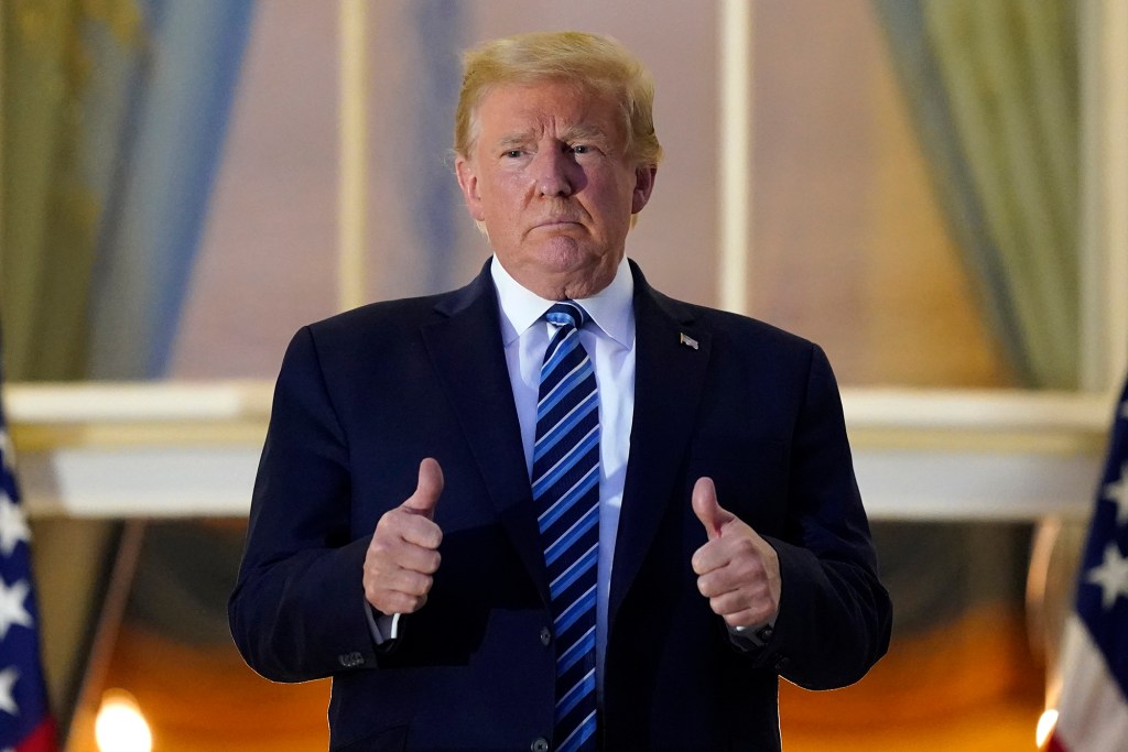 Trump, still infectious, back at White House — without mask