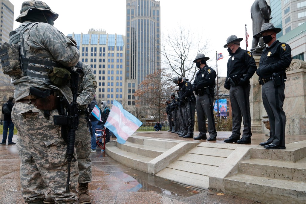 Small numbers of protesters gather at fortified US capitols