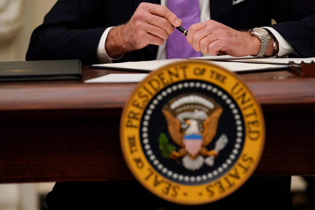 Biden orders restoration of federal employee protections