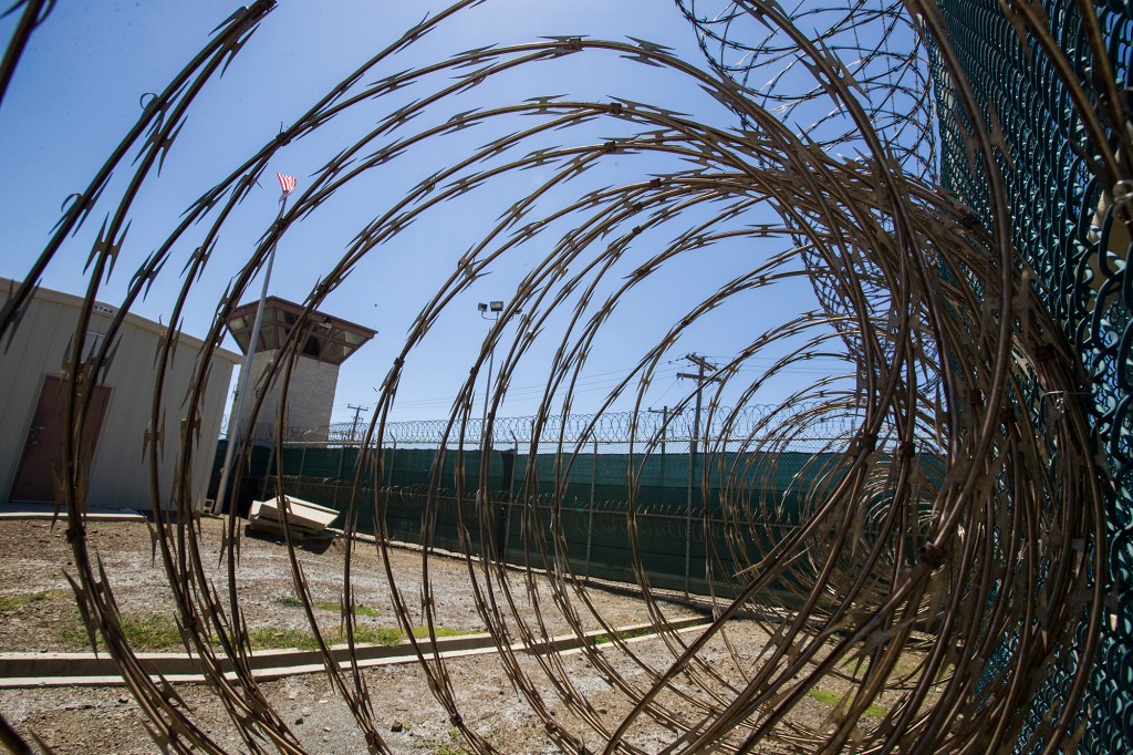 Defense Department pauses plan to give COVID-19 vaccine to Guantanamo prisoners