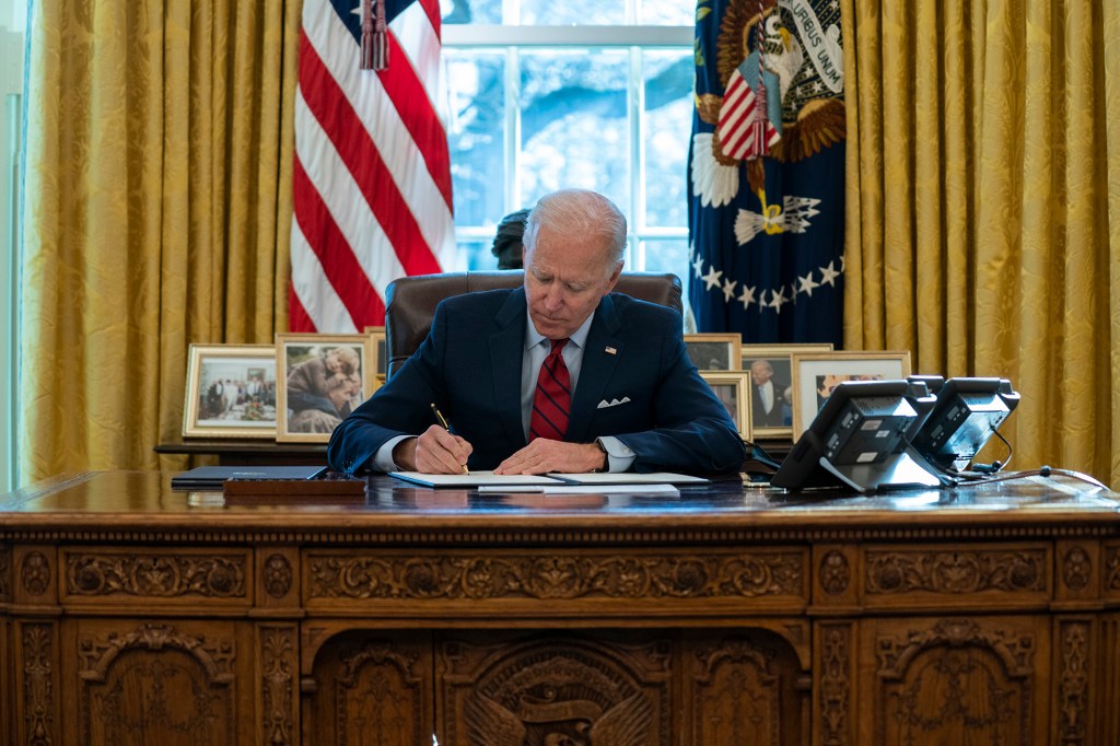 In early going, Biden floods the zone with decrees