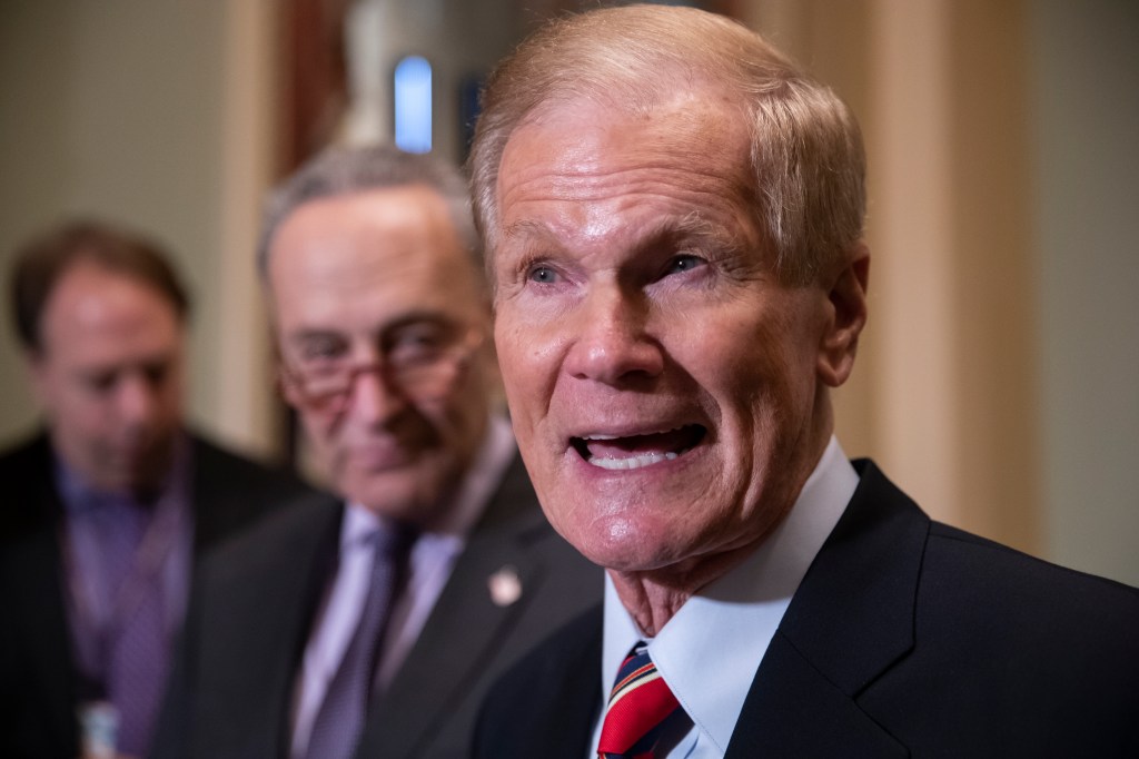 Biden picks former senator who flew in space to lead NASA