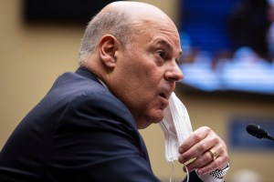 Justice Department probing postmaster over fundraising