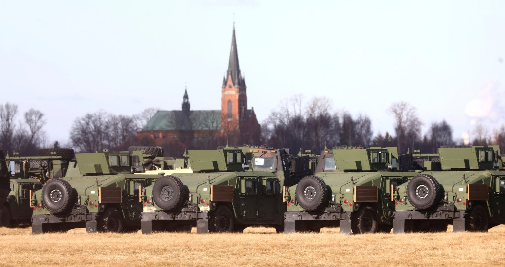 Paratroopers build camp and prepare to train with Polish forces