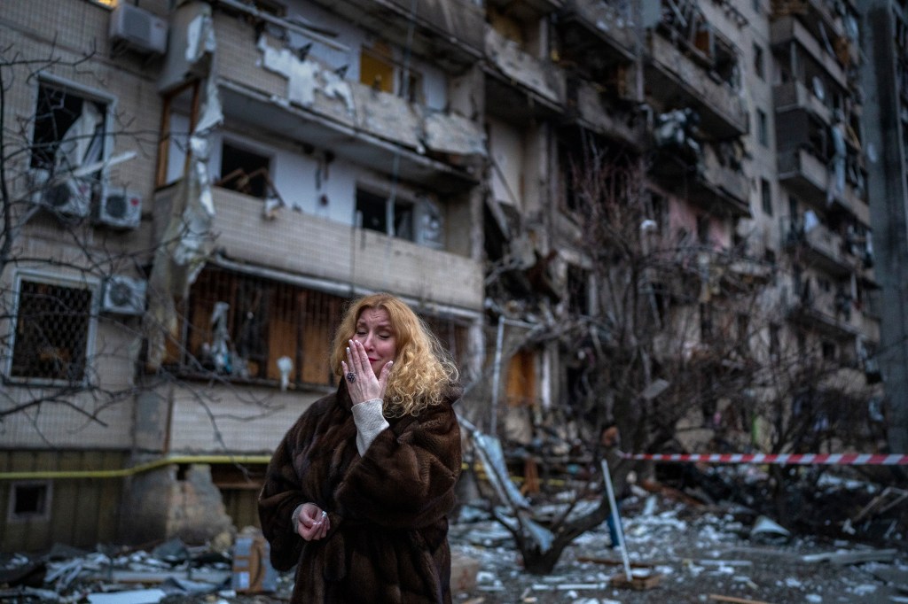 ‘Make Molotov cocktails!’: battles rage in Kyiv and other Ukraine cities