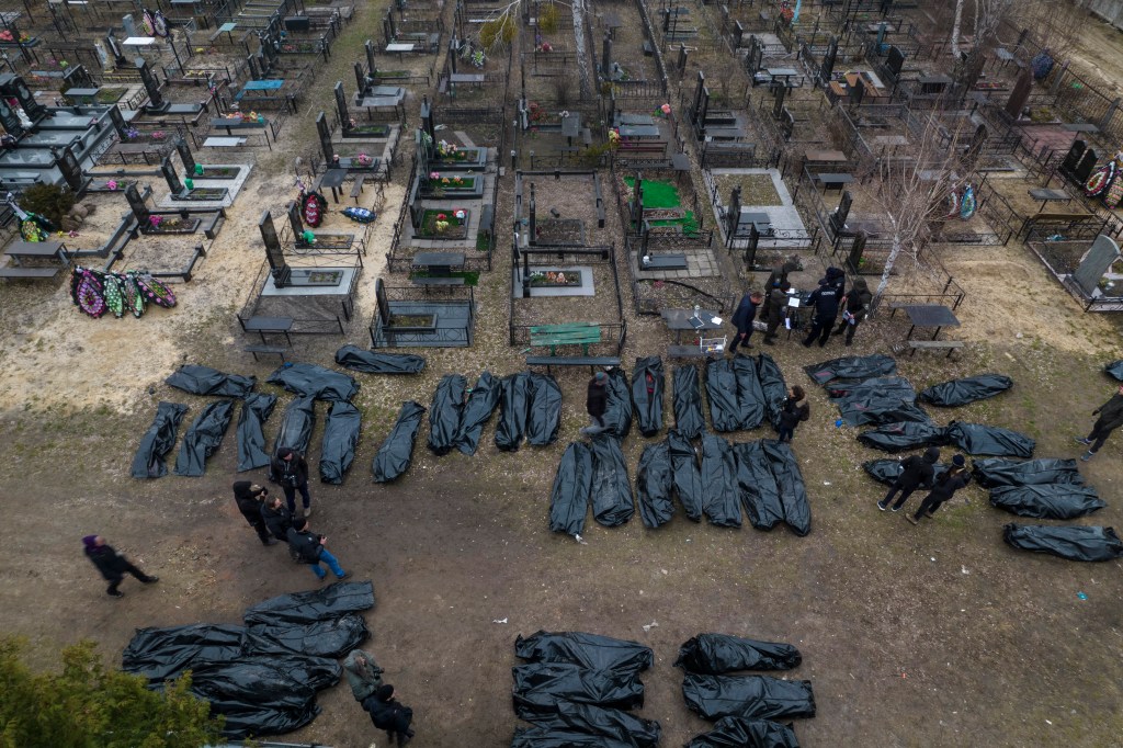 Russians preparing for new push as Ukraine gathers its dead