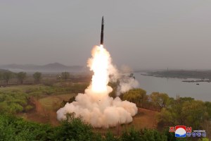 North Korea says it tested new solid-fuel long-range missile