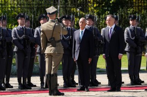 Poland says Russia’s moving tactical nuclear weapons to Belarus