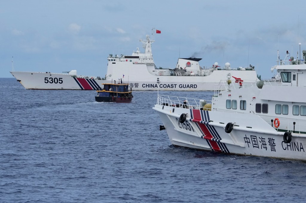 Philippine supply boats breach a Chinese coast guard blockade