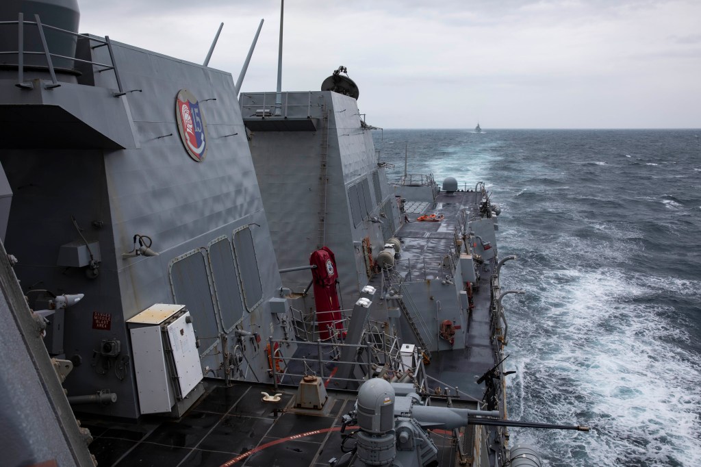 Taiwan says China is bolstering nearby coastal military bases