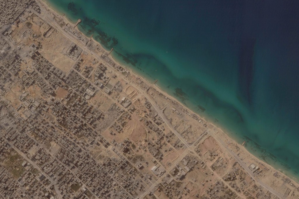 Satellite photos show punishing campaign as Israel pushed into Gaza