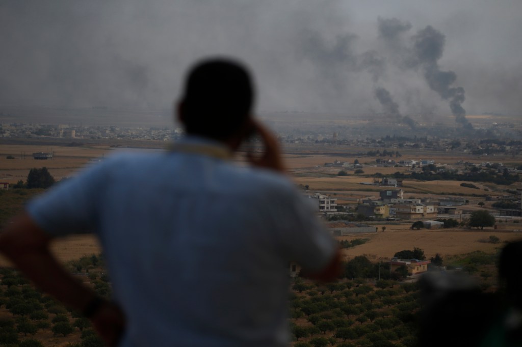 Trump says US troops are ‘totally safe’ amid growing chaos in Syria