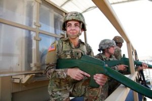 As soldiers deploy amid pandemic, they fight 2 battles